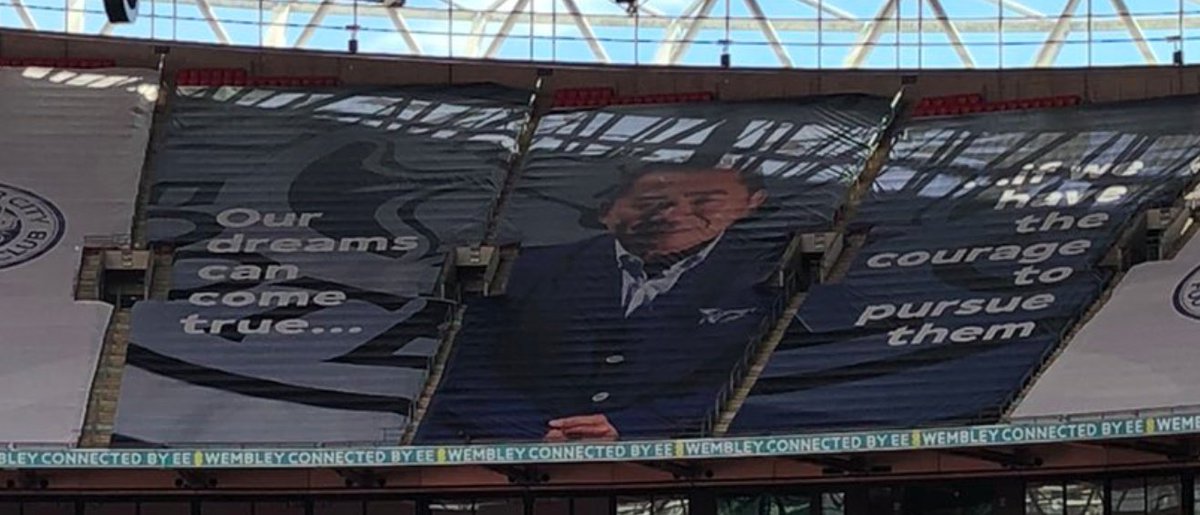 TB1884's tweet photo. Khun Vichai banner at Wembley:

"Our dreams can come true... if we have the courage to pursue them"

#LCFC #FACupFinal (@JrdnBlackwell) https://t.co/s0G1rvQSRu