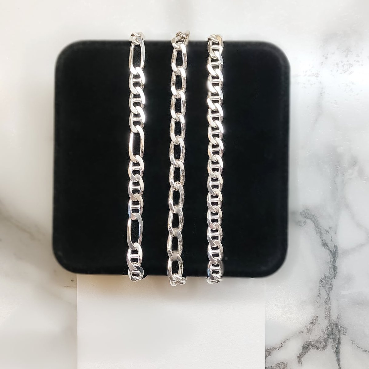 IGIKelowna's tweet image. What's your chain style? Figaro anchor chain, open curb heavy chain or anchor heavy chain? We have a great selection of choices in men's chains. #menschains #chainstyles #giftsforhim #fathersdaygifts #kelownajewellery