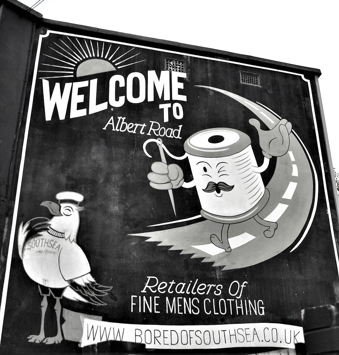 Albert Road in Southsea is a great street with eclectic shops, restaurants and bars. #southsea #albertroad #bnw_captures #bnwphotography #bnw #blackandwhitephotography #blackandwhite #Monochrome #Portsmouth #advert #mural #art #StreetArt #streetphotography