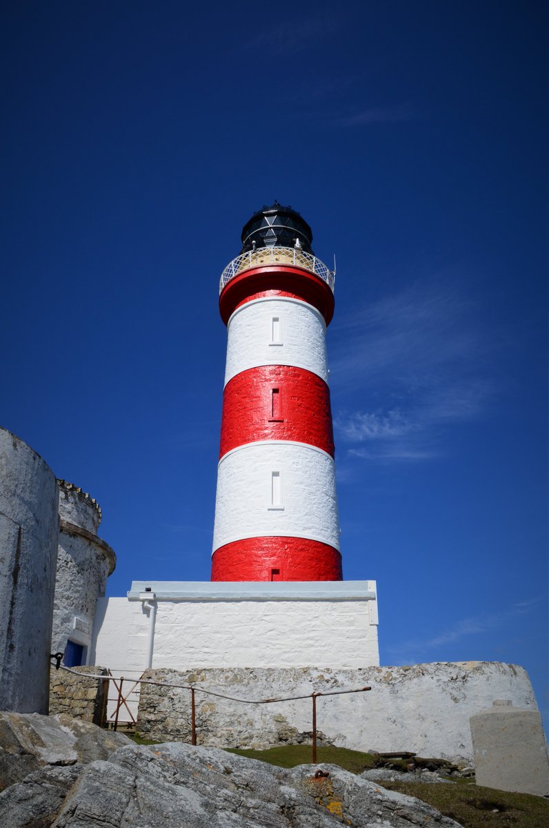 harrisdistiller's tweet photo. The first iconic building seen by most visitors approaching the Isle of Harris by sea is this stunning lighthouse.  Eilean Glas lighthouse on the eastern side of the Island of Scalpay has been guiding sailors since 1789. #Harrisathome #HarrisGin https://t.co/diaHNmUcQU