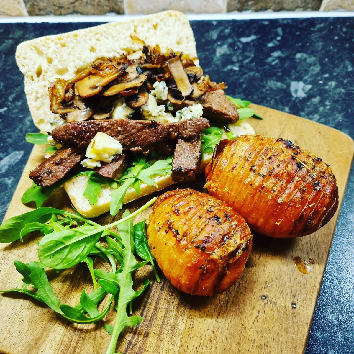 Steak and blue cheese ciabatta, with mushrooms and caramelised onions on a bed of rocket and a side of hasselback potatoes.
dadfood.co.uk #food #foodblogger #foodlover #foodpics #chef #chefs #steak #bluecheese <a href="/jamieoliver/">Jamie Oliver</a> <a href="/gennarocontaldo/">Gennaro Contaldo</a> <a href="/jamesmartinchef/">James Martin</a> <a href="/matt/">Matt Deegan</a>.tebbutt
