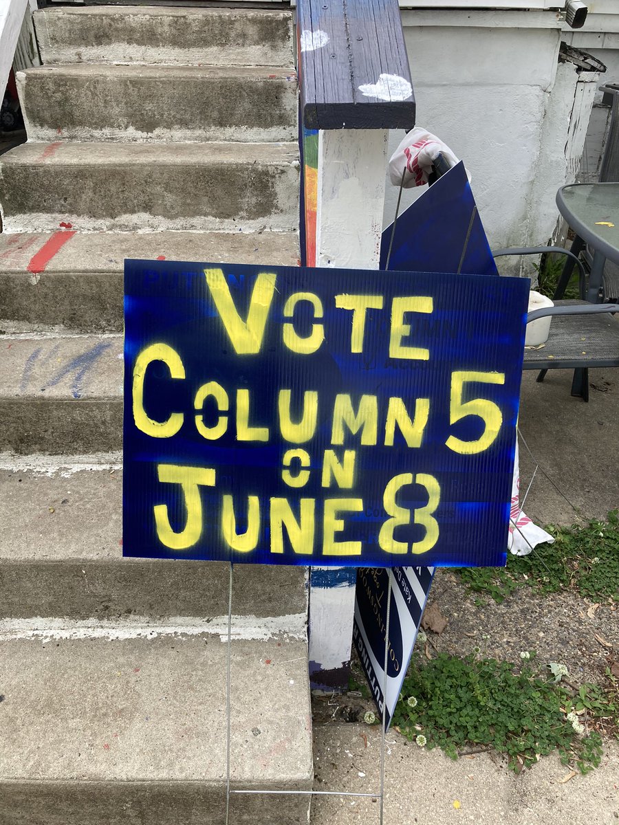 delany_kate's tweet photo. Moving right along! My committee—@CollsDems—are incumbents way off the line in this year’s primary. We repurposed municipal election signs to remind #Collingwood Democrats to Vote Column 5 on June 8. (And yes this signature look was achieved w spray paint & homemade stencil 😊) https://t.co/IDD5pXrDEc