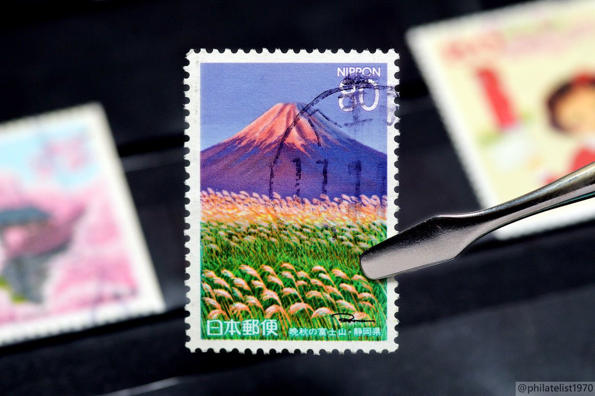 Mount Fuji is illustrated on the 1997 80Y Japan postage stamp. The old volcano is the tallest mountain in the country (3776 mt). #philately #filatelia #collection #ephemera #japan