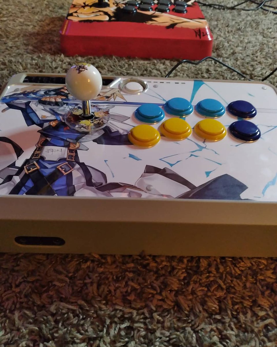 noodlezxdoodlez's tweet photo. @focusattack Thank you guys for the awesome print for my stick! As well as @ArcadeShock for the guilty gear dust cover,buttons,balltop,and joystick. Really like how this all came together #arcadestick #sanwa #videogames #joystick #custommods #focusattack #arcadeshock #kykiske https://t.co/71tiWzOjwV