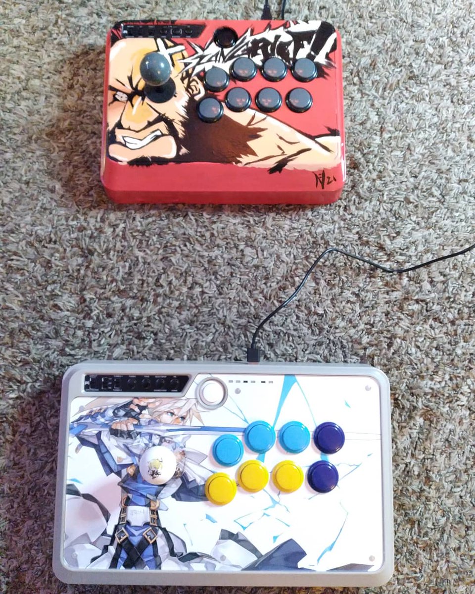 noodlezxdoodlez's tweet photo. @focusattack Thank you guys for the awesome print for my stick! As well as @ArcadeShock for the guilty gear dust cover,buttons,balltop,and joystick. Really like how this all came together #arcadestick #sanwa #videogames #joystick #custommods #focusattack #arcadeshock #kykiske https://t.co/71tiWzOjwV