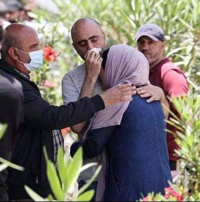WeAreNotNumbers's tweet photo. This is Om Rami Abo Alouf hugging her eldest child, Rami, and they have only each other now after the Israeli warplanes wiped all their family while sleeping last night. 
#Gaza
#GazaUnderAttack https://t.co/LD5qMN4zad