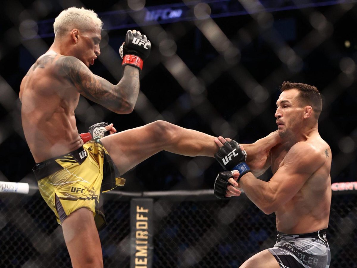 Charles Oliveira claims title with TKO of Michael Chandler at UFC 262