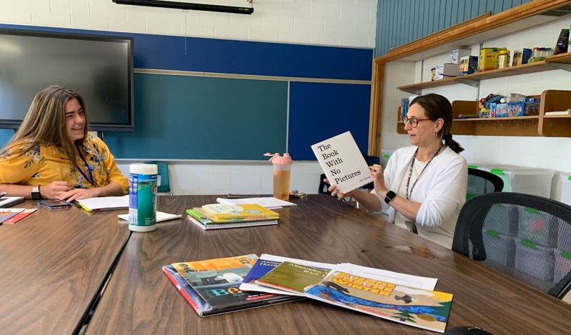 SSTRegion4's tweet photo. Madison PreK teachers planning read for alouds and explicit vocabulary lessons during lunch. The learning never stops. #sst4earlyliteracy #wearemadisonblue #vocabularylessons #lunchlearning https://t.co/79M9RLlSyM