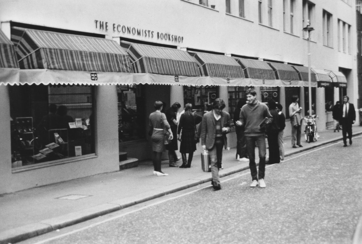 LSELibrary's tweet photo. We've heard that The Economists' Bookshop won't be reopening again on campus. It's been part of the landscape since 1947! Here are some photos taken over the years of the building and staff. https://t.co/KDgYrCVxBI