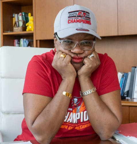 ChancellorMCC's tweet photo. Having a little #SuperBowl wager was a lot more fun when it was the other team paying off! But, a bet's a bet... So, here I am Friday wearing the #GoBucs gear our friends at @HCCFL sent. I think I look as happy as I felt... 🏈😭 https://t.co/cmAddLiaXg