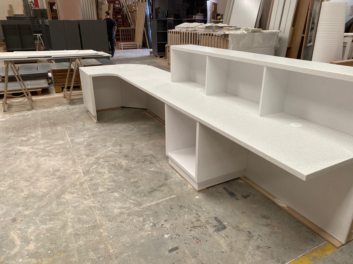 Reception Desk clad in Hi-macs White Quartz.
#himacs #madeinhull