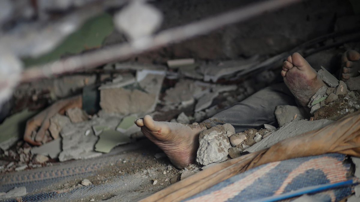 ameenyousef08's tweet photo. Palestinian rescue workers pulled dead bodies from the rubble of buildings destroyed by Israeli airstrikes in Gaza City. The air raids killed at least 42 people, including 10 children. Israeli Prime Minister says the raids will continue in "full force"
 #IsraelStopPlayingVictim https://t.co/6kT7V2Oj6m