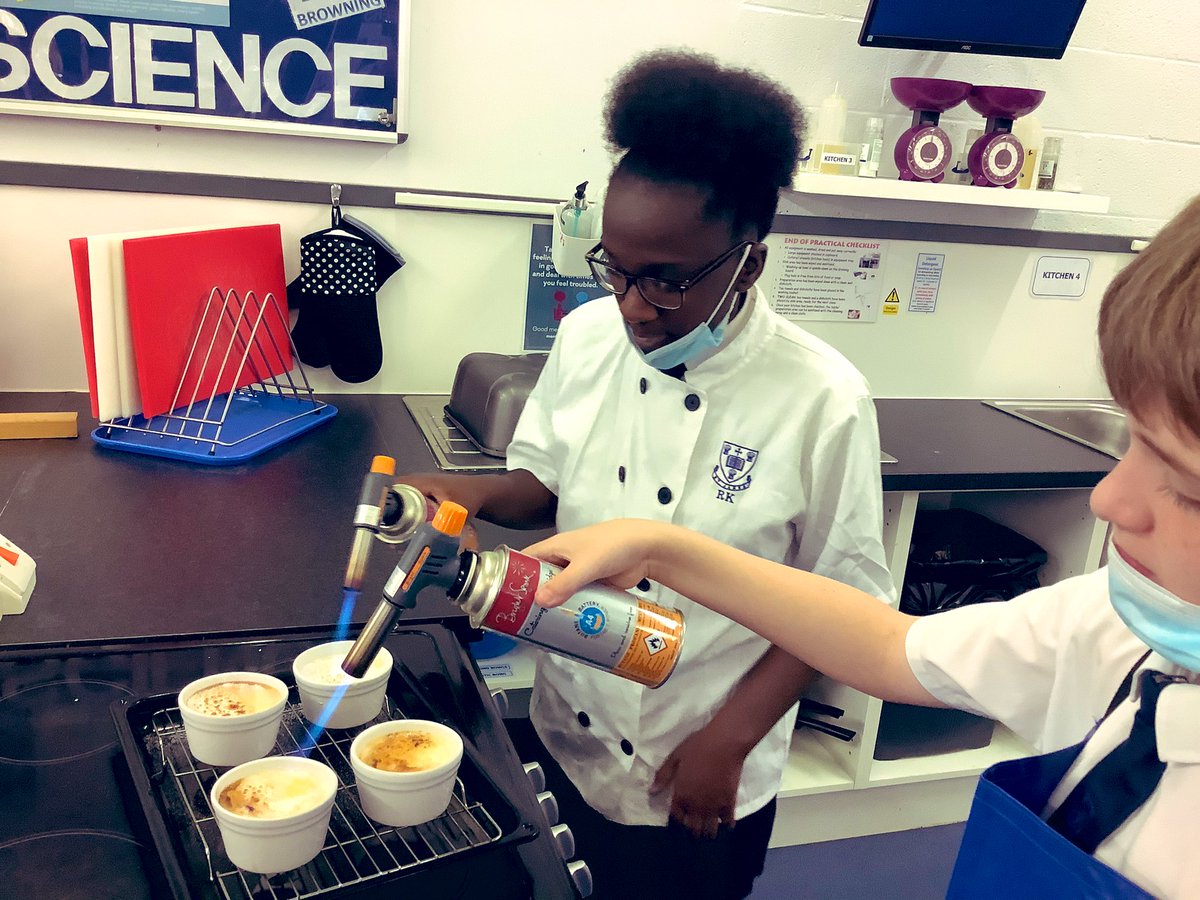 StJamesFood's tweet photo. Year 10 GCSE pupils learning how to use blow torches safely to demonstrate caramelisation whilst finishing their creme brûlée’s #caramelisation #carbohydratemodule #excellence #WeAreStJames https://t.co/5CFRqB7Dem