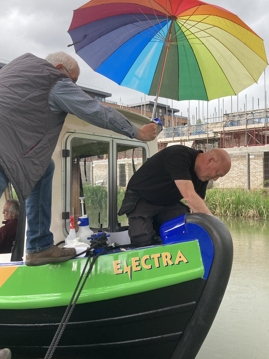 One fully branded #electricboat 😊 Favourite photo of the day!  ☔️@ElectraBoatMK  #ElectraBoatMK #communityboat #loveMK