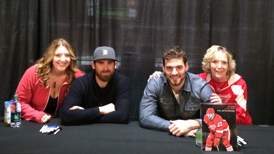 WingGirl86's tweet photo. @UpperDeckHockey @WingNutMom19 got us to jump right in for this photo, while some others stood in front of the table!! Season Ticket Holder Open House November 2014 #Zetterberg #Lashoff https://t.co/Ru5z4GwKCc