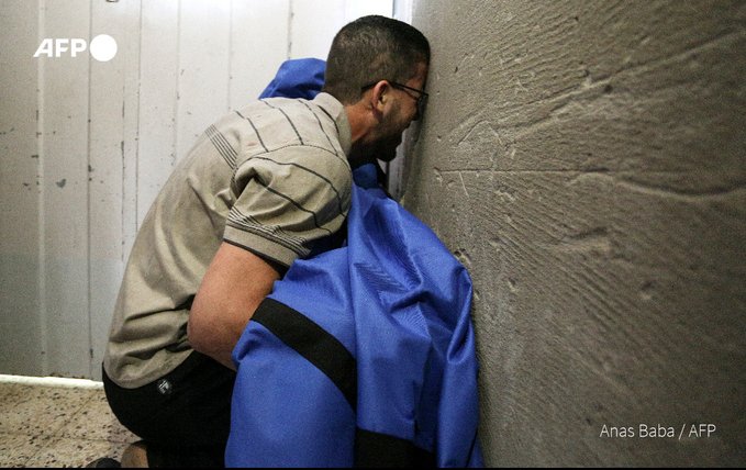 itranslate123's tweet photo. Heartbreaking: Israel brutality has reduced Palestinian parenthood into this. 
Palestinian father clutches at the body of his daughter, 12, who was slaughtered by Israel.
We will never let it go.
#GazaUnderAttack https://t.co/Y8eCTLRxpz