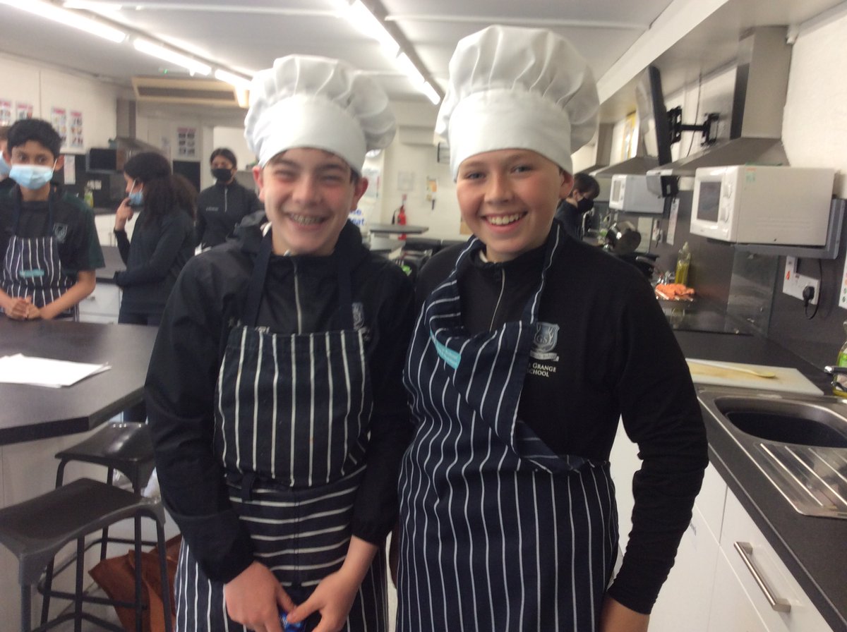 Head chefs Henry and Oliver passing the baton to Vibha and Geethan after the vegetarian protein practical lesson. The head chefs have to nominate the two people who they think contributed most to the lesson while making sure everyone is on track with their cooking!