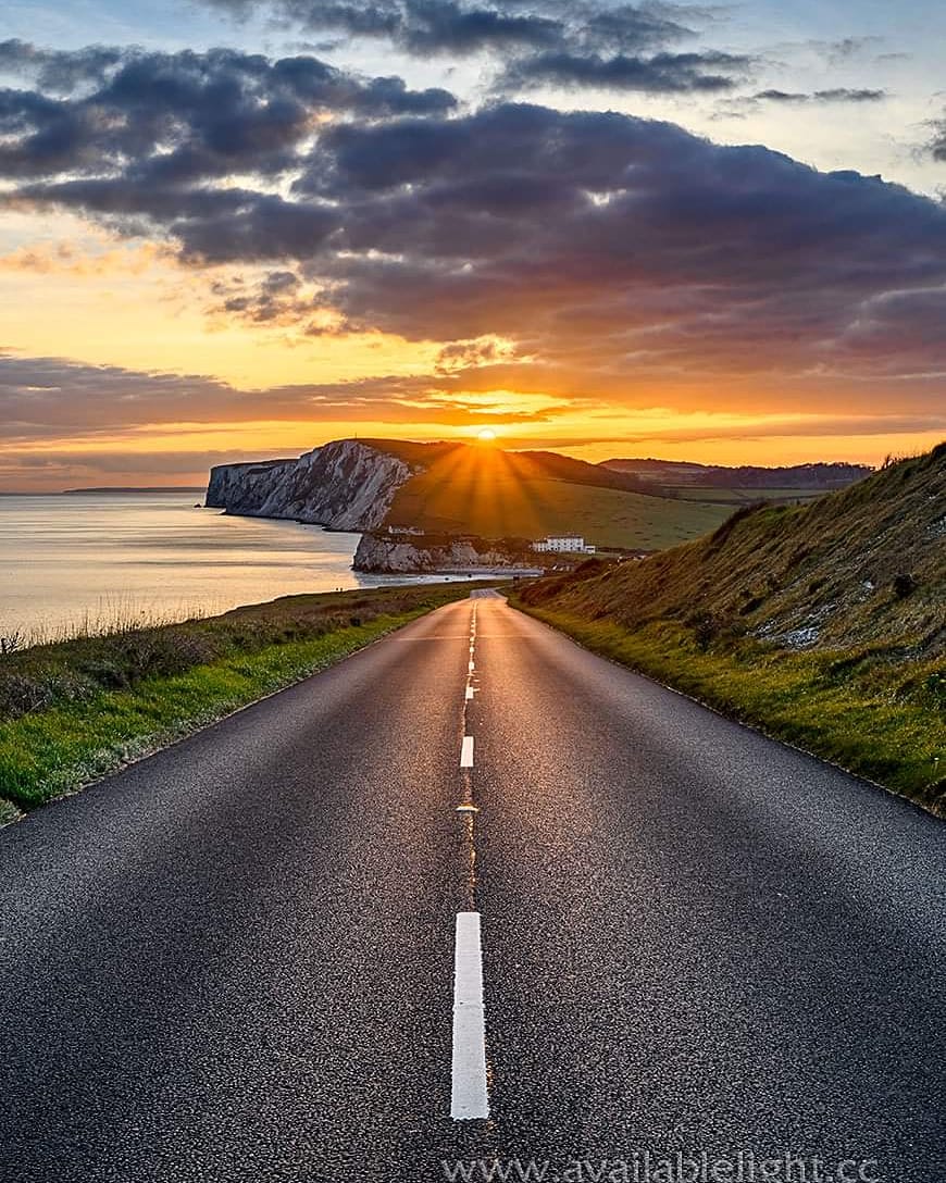 Availablelightp's tweet photo. Sun down on the Military Road. One if the most scenic drives in the country! https://t.co/gY9OJFqhkV