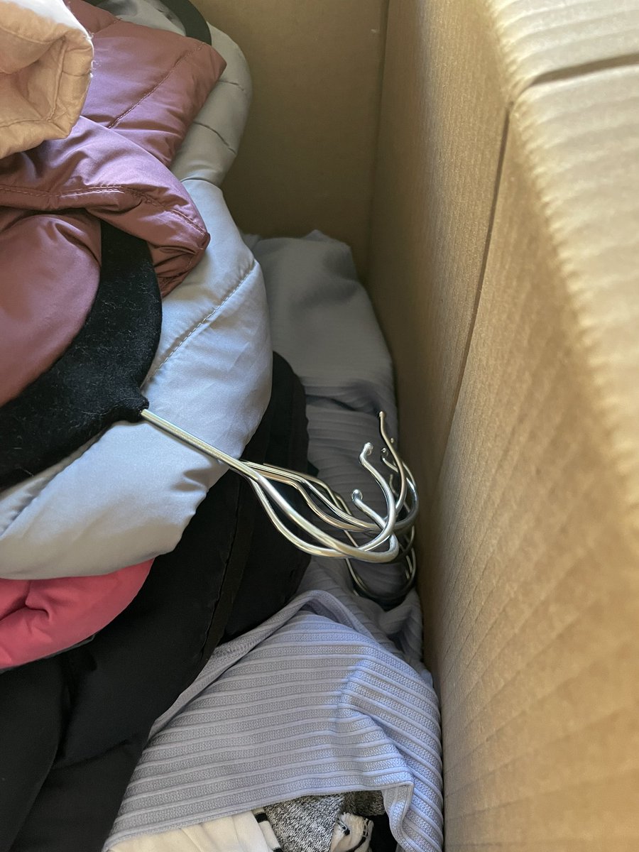 Is it too much to ask that movers use Wardrobe Boxes when packing hanging clothes.  Nope let’s fold them in half keep the hangers on and shove them in a box......not going to be fun to press/steam all this stuff #PCSseason #militarymovers