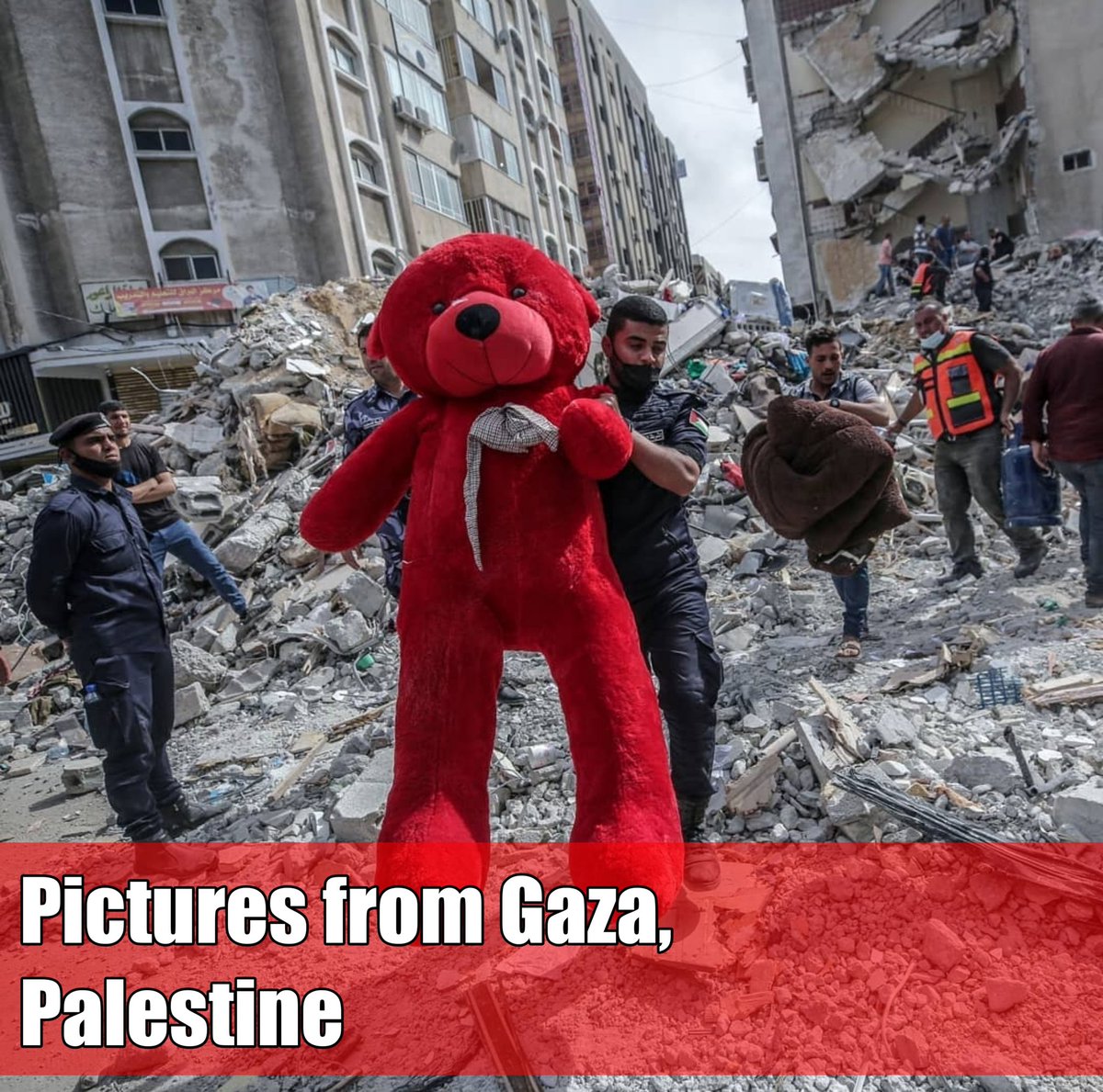 The_RedEarth's tweet photo. This is A picture from Gaza, Palestine. Where a critical situation is going on in between Israel and Palestine. The Israel army fire bomb on the Gaza city of Palestine. In this picture savior carry a doll. Many buildings are destroyed badly. People are rescue to the safe places. https://t.co/xtswBenV5W