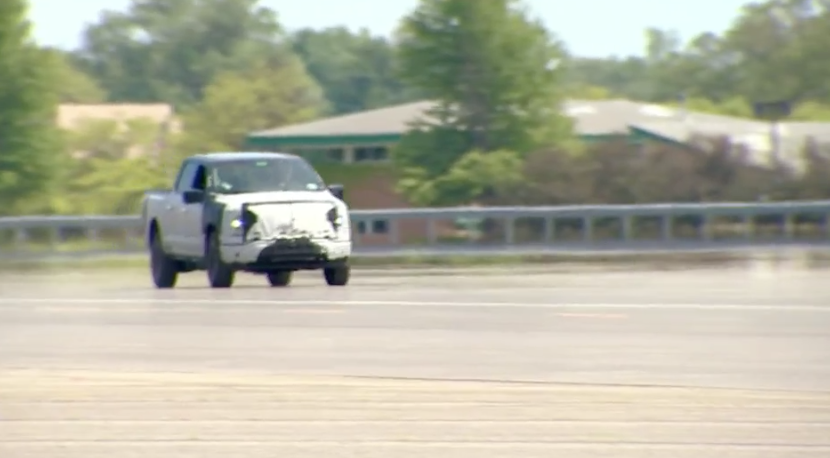 kaitlancollins's tweet photo. President Biden is currently driving a F-150 Lightning through an empty lot, with a Secret Service agent in the passenger seat. "This sucker's quick," he told reporters. https://t.co/KsVzZiVDB6