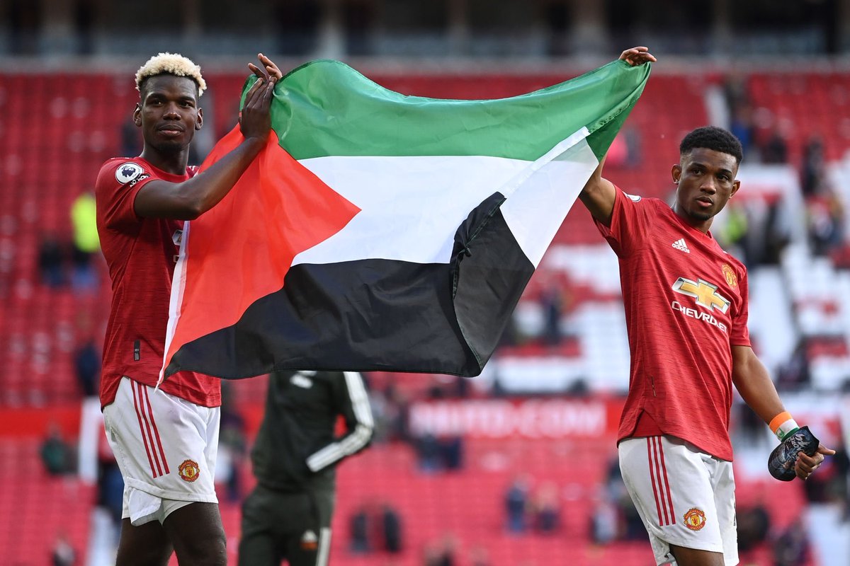 UnitedUpdates's tweet photo. Amad Diallo and Paul Pogba showing their support for Palestine at full-time 🇵🇸✊ #MUFC https://t.co/xJ6LmphBje