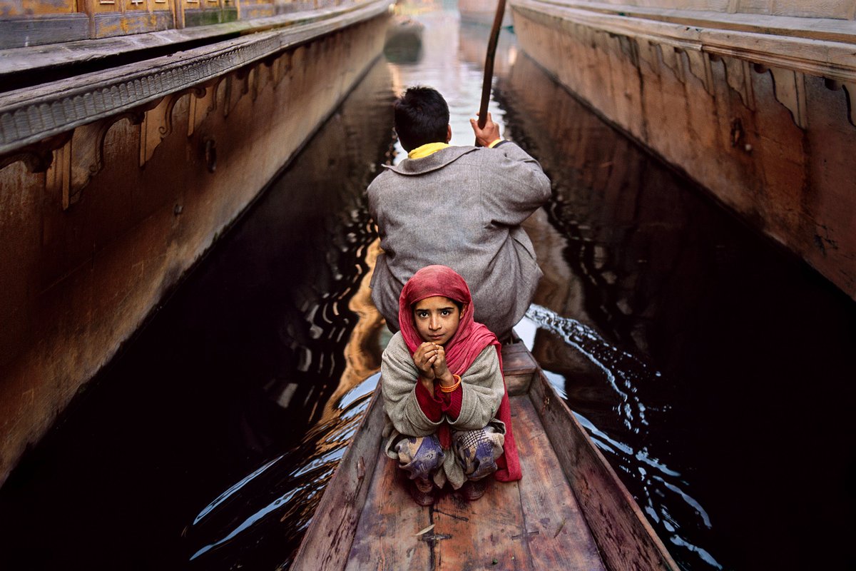 Father and daughter on Dal Lake. Srinagar, Kashmir, 1996.