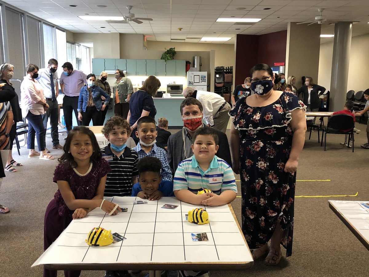 What?! Bradford Kindergarten and 1st grade students teaching Dr. Kingman (board members) how to travel by coding Beebots. #SAISDStem21