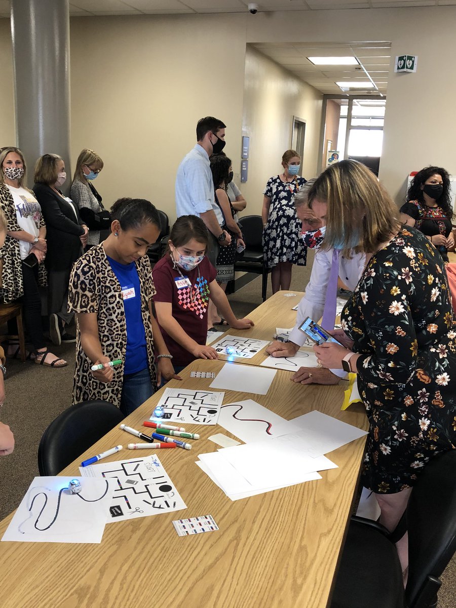 Board Members Lani and Ami getting some schooling by 4th graders at Goliad on Ozobots. #SAISDStem21