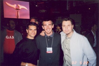 PaulGaleNetwork's tweet photo. @Victor_Lucas & @Vics_Basement, here’s a blast from the past pic from @E3’s #E32001...20 years ago! You and Julie were great. @TommyTallarico, here’s our pic from #E32002. (We met but no photo from ‘01.) Thank you guys for 20 years of friendship and support. Here’s to #E32021! https://t.co/DVpxlDY6eS