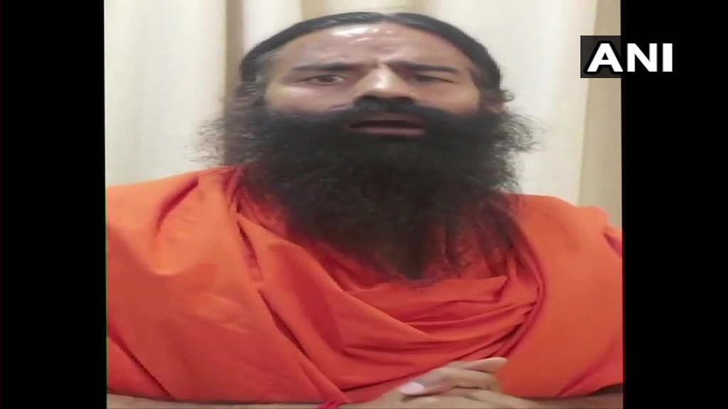 timesofindia's tweet photo. Defaming Kumbh Mela &amp; Hinduism through Toolkit is a social, cultural &amp; political conspiracy &amp; crime. I request people doing this that they can do politics but don't insult Hindus. This country won't forgive you. I appeal to people to boycott &amp; oppose such forces: Yog Guru Ramdev https://t.co/pDumI1HIpM