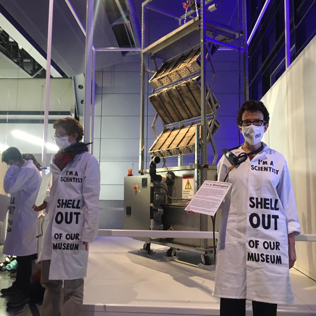 XRebellionUK's tweet photo. Scientists are locked onto the carbon  capture exhibition @sciencemuseum right now to say no to greenwashing @Shell.

Those who continue to destroy the planet can not get us out of this mess. #ClimateEmergency #KeepItInTheGround #ShellOut https://t.co/anW0wctvjF