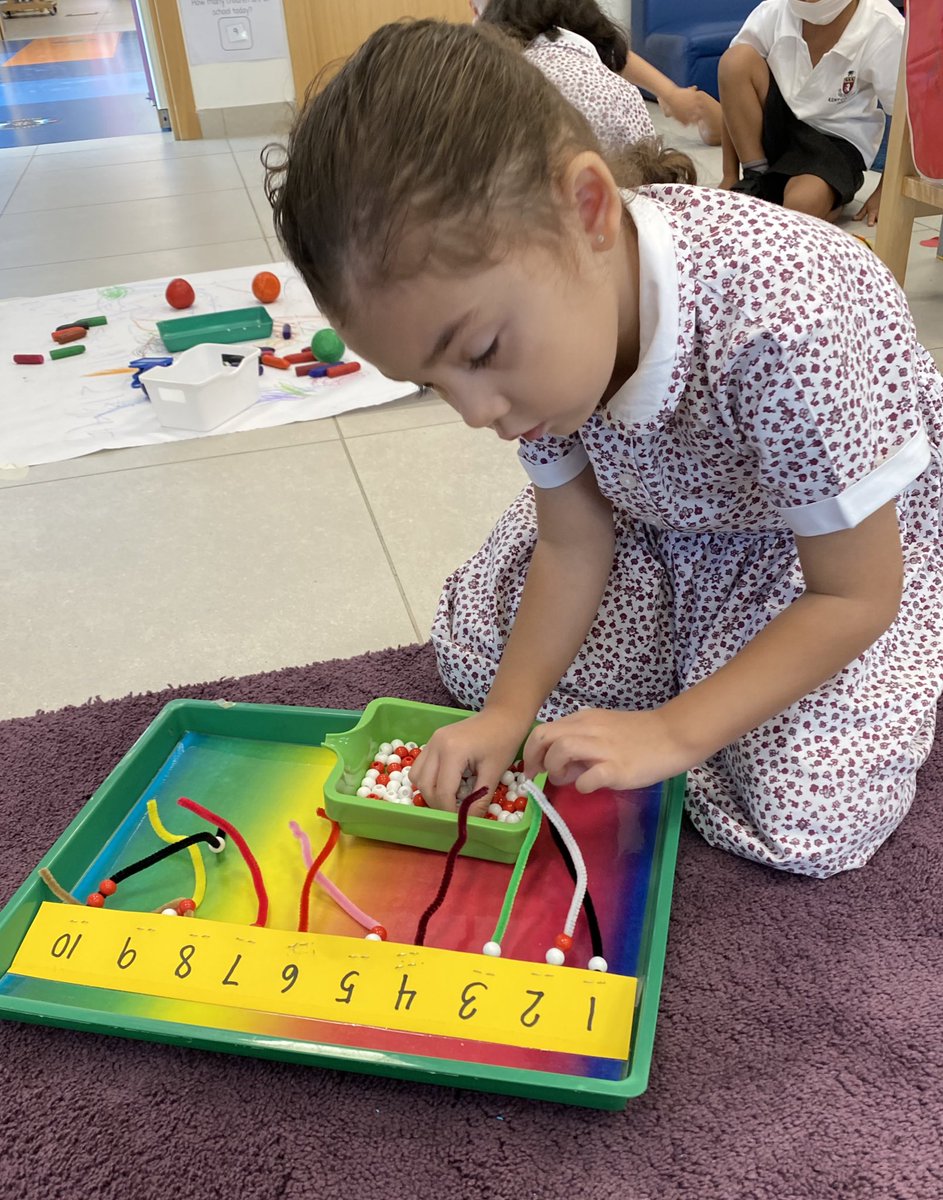 kcd_fs1's tweet photo. Giraffe Class have been working hard practising their fine motor skills to thread the correct amount of beads onto the pipe cleaners. #maths #number #finemotor https://t.co/Yot80TQNcr