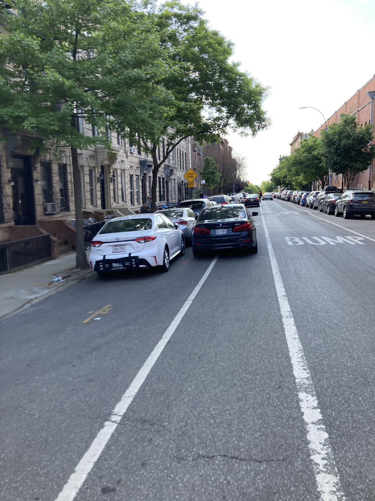 Photo of car in the street with license plate KGJ 7802 in New York