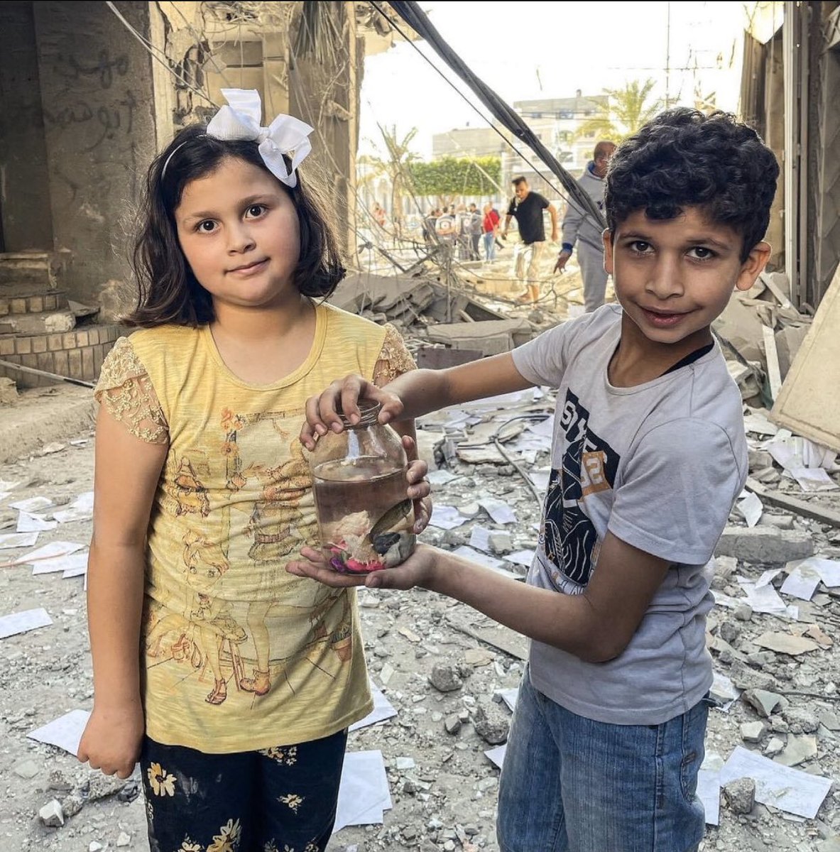 In the midst of destruction, they found smiles and joy knowing they rescued a fish from the rubble. They come to show the world they saved a life... Heroes of Palestine.