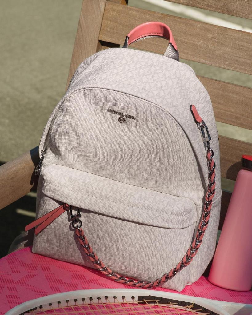 Michael Kors on X: Courtside with the Slater backpack in our Signature  print.  #MKGO #MichaelKors   / X