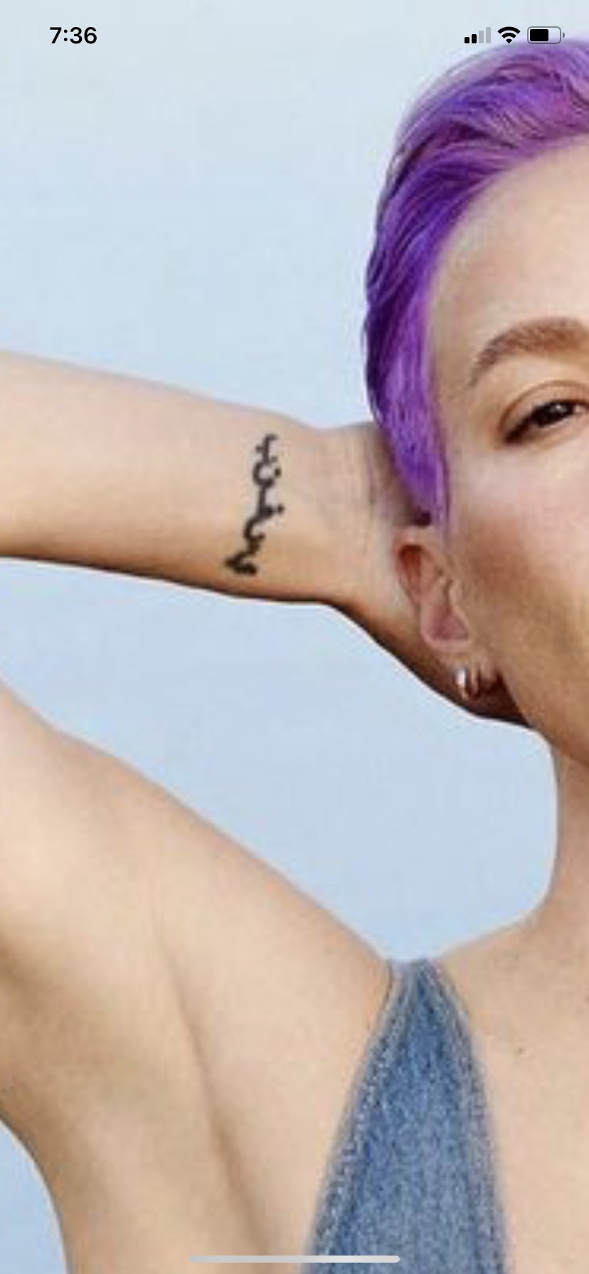 The Meaning Behind Megan Rapinoes Tattoos  POPSUGAR Beauty