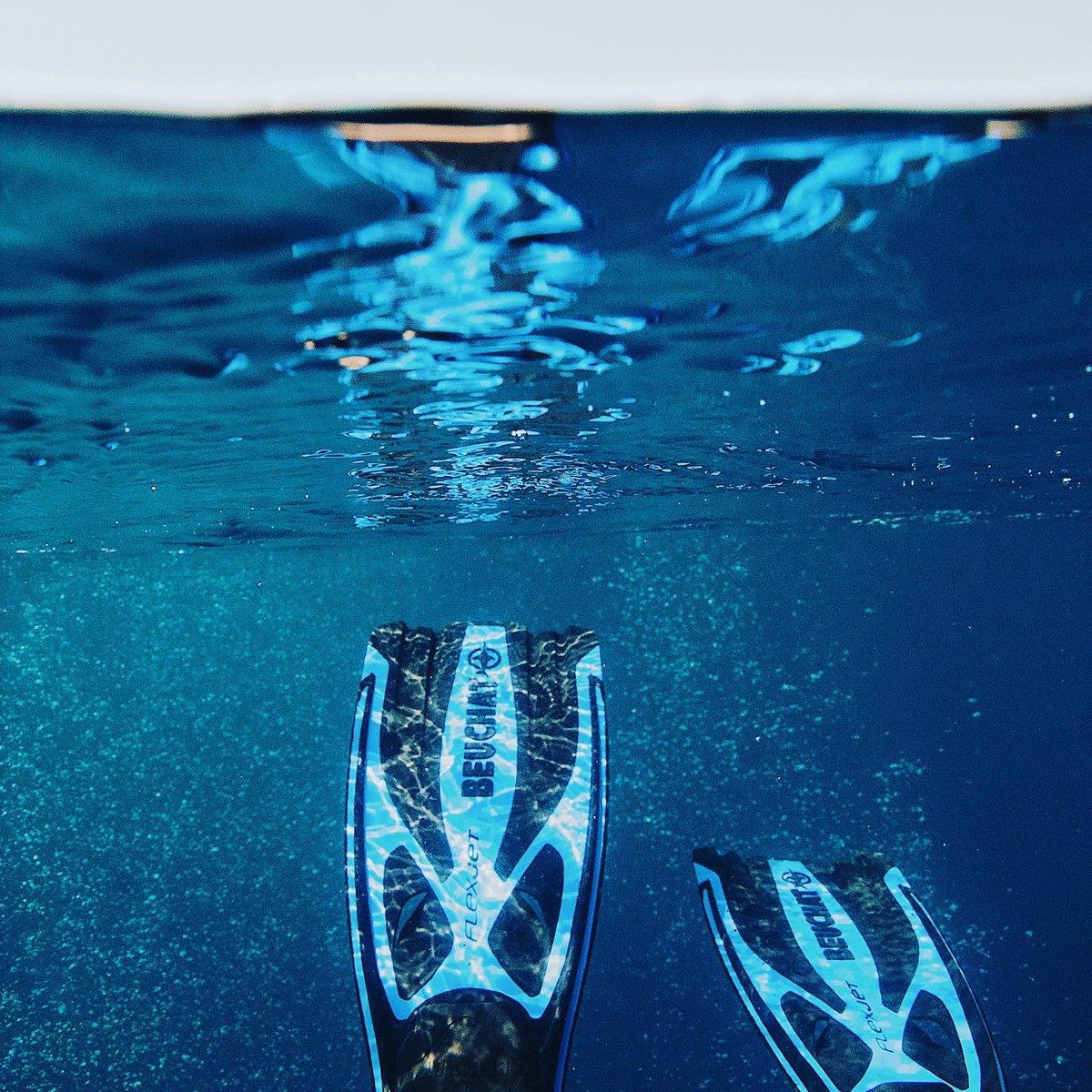 Underwater I hear the water coming to my body, I hear the sunlight penetrating the water.