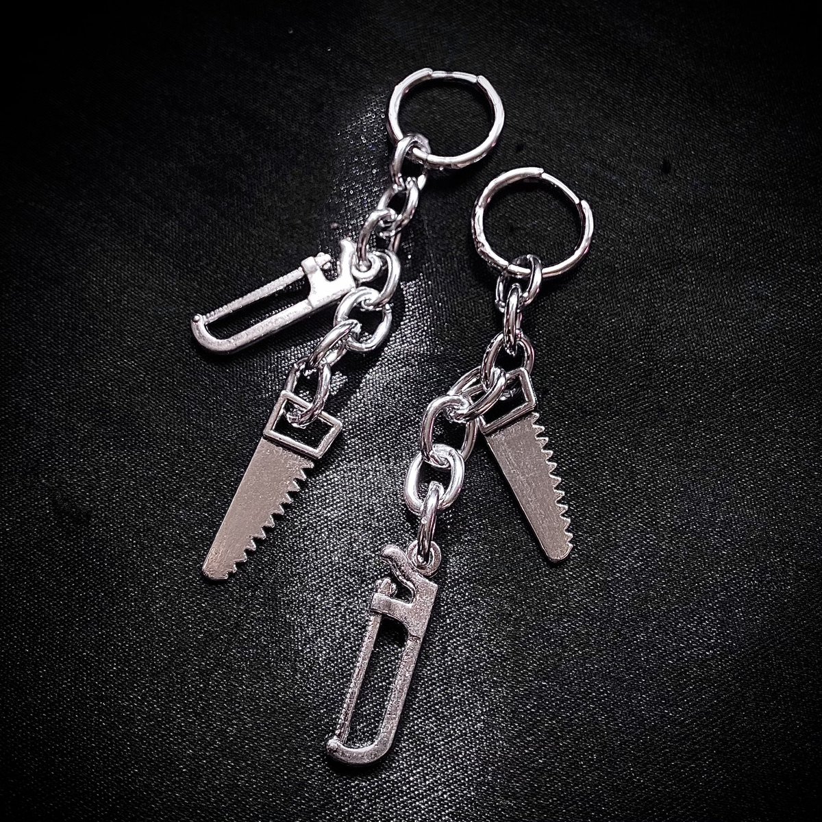freshfleshtat's tweet image. “SAW IV” earrings available tomorrow🪚