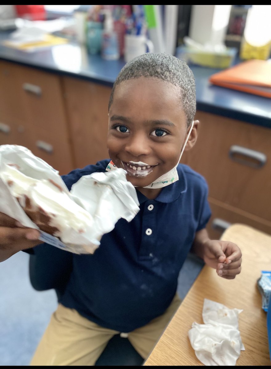 A little mask break for some ice cream, celebrating excellent attendance in Kindergarten. This #28 Howler seems happy! <a href="/RCSDNYS/">Rochester City School District</a>