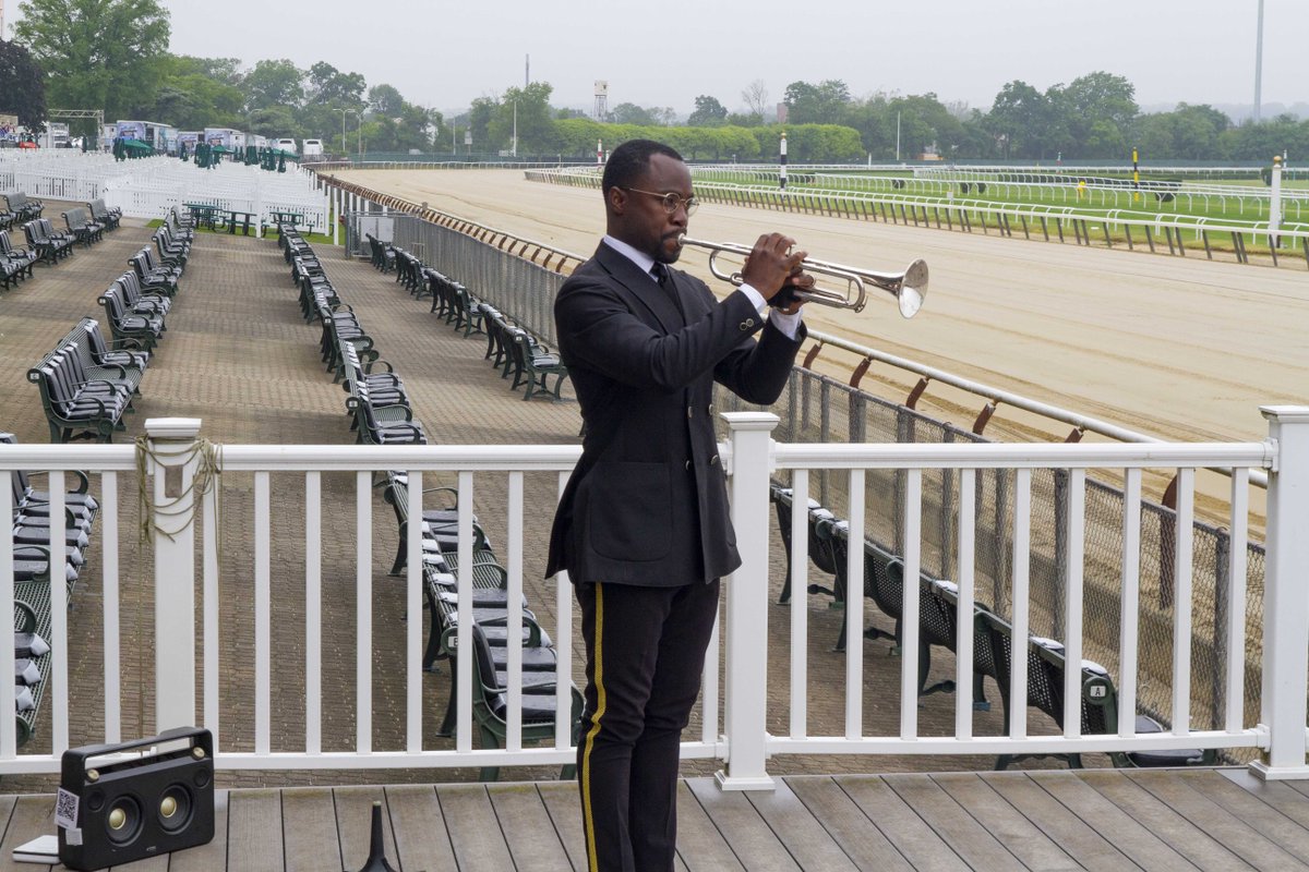 playing the trumpet at belmont park
