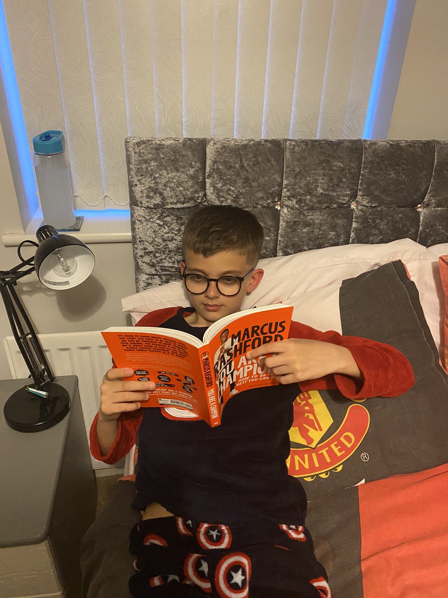 @MarcusRashford My son Alfie getting his bedtime reading in. He’s loving the new book. #inspirational #YouAreAChampion