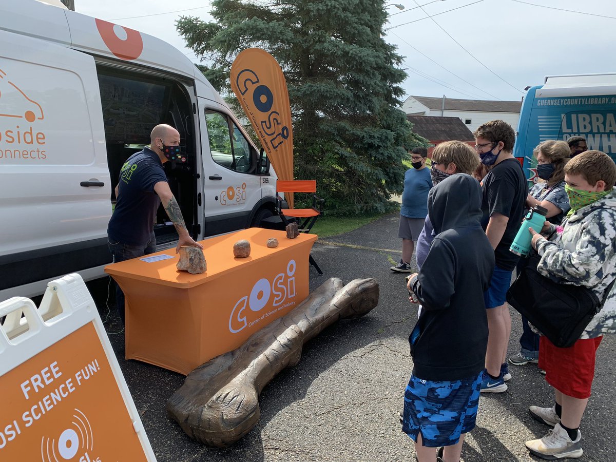 MMSMAKERS's tweet photo. What a great way to kick off summer camp! We had so much fun hanging out with @COSI and learning about dinosaurs. The students also got to check out books from the @gcdpl’s book mobile and get signed up for the summer reading program! https://t.co/F5OUvLVEh5