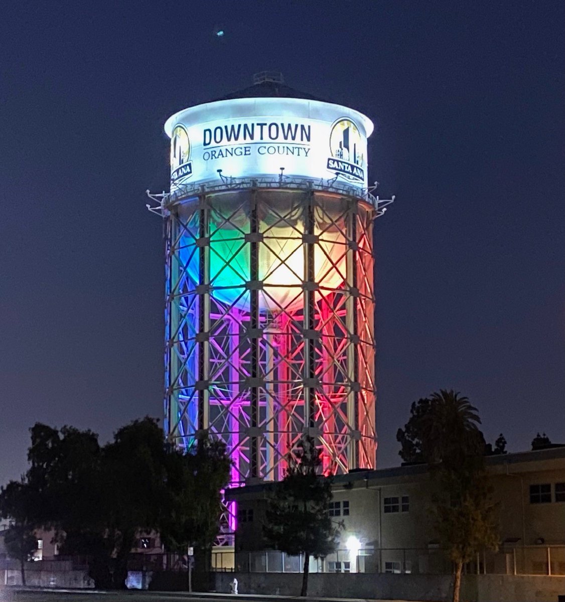 CityofSantaAna's tweet photo. Happy Pride Month! We have lit up the Santa Ana water tower with a rainbow in celebration of LGBTQ+ Pride month. Santa Ana is proud to be a city of diversity, equality and inclusivity. #SantaAnaPride #PrideMonth https://t.co/xfWXZt6xlD