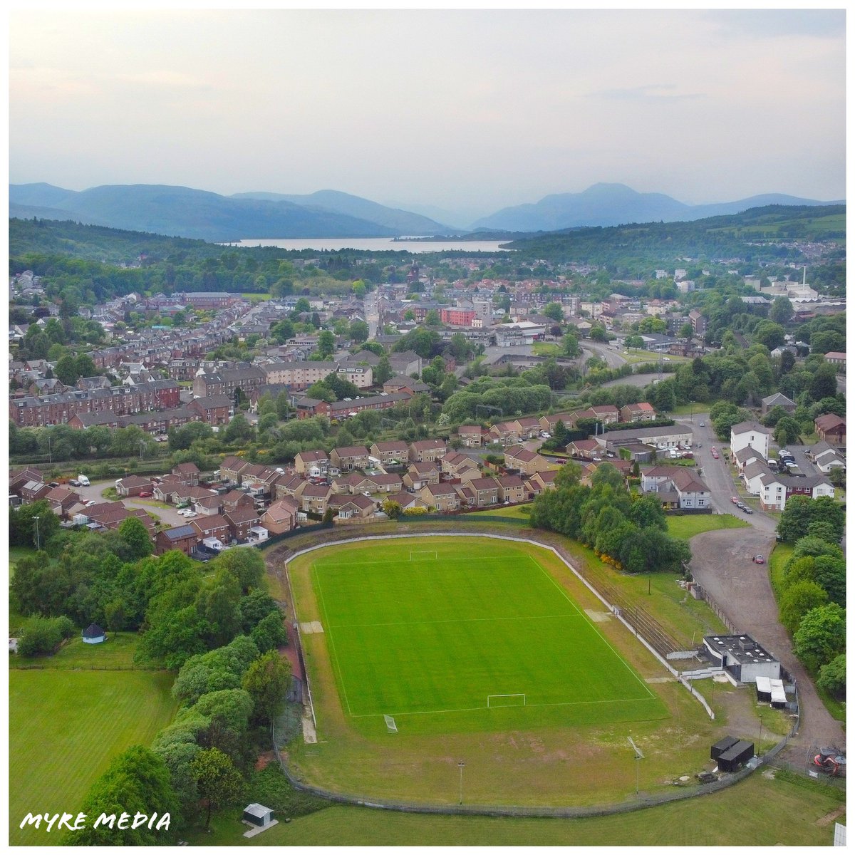 MyreMedia's tweet photo. 🏟📍 Millburn Park, home of @ValeofLeven, with Loch Lomond and Ben Lomond on the horizon. https://t.co/tF0UcqEGdq