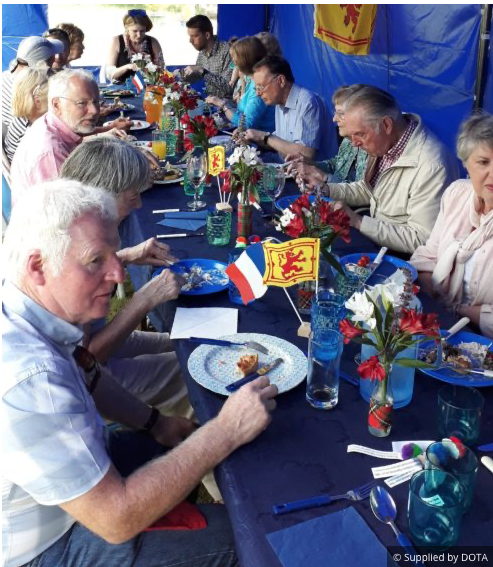 Members of DOTA celebrating Bastille Day in 2019