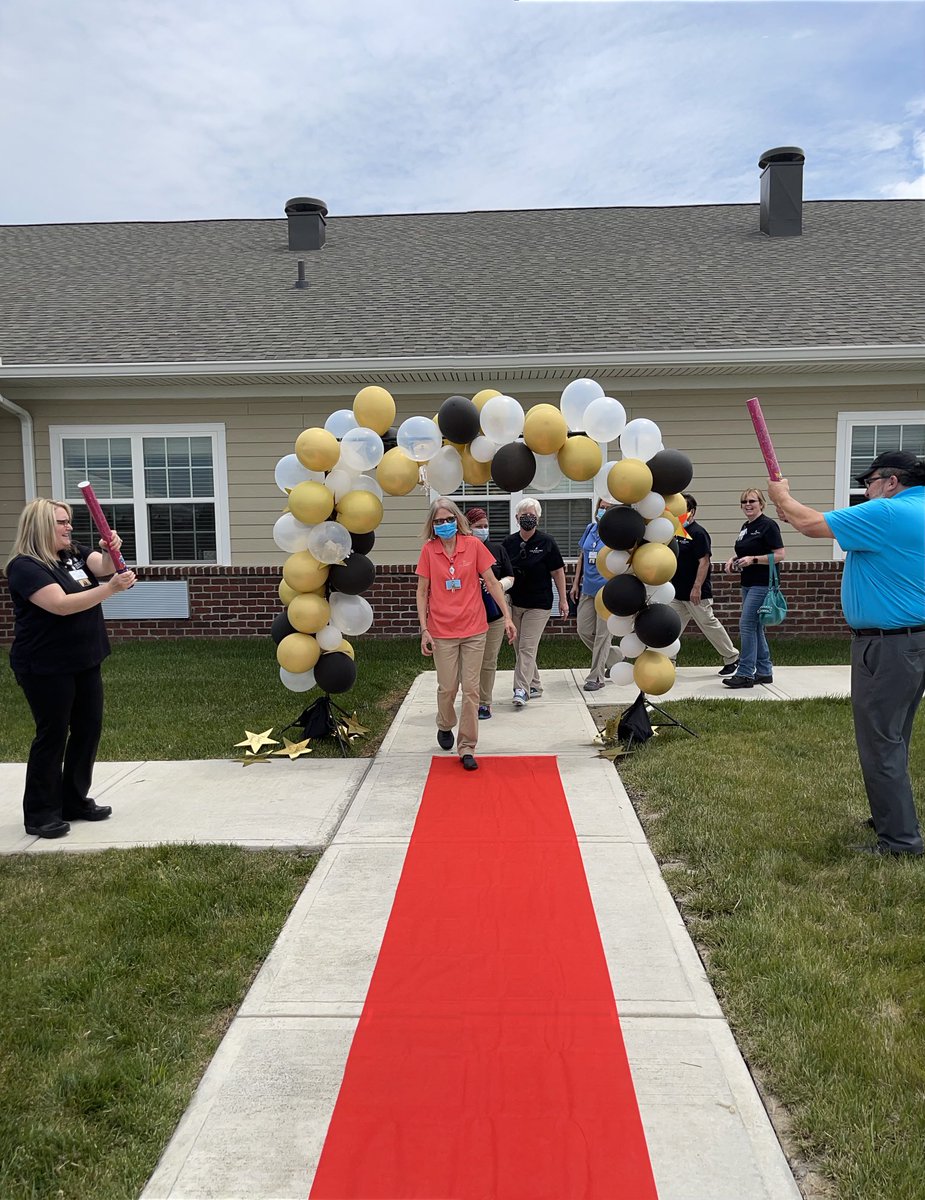 LeighAnnBarney's tweet photo. Celebrated our #1 CSS winner today by rolling out the red carpet for this team @WillowsTiffin. Hoisted the trophy and gave out some #SweetNebraska corn. This team opened a brand new campus a few months before COVID hit yet still provided #BHCM service! https://t.co/LwrXcZ4GYX