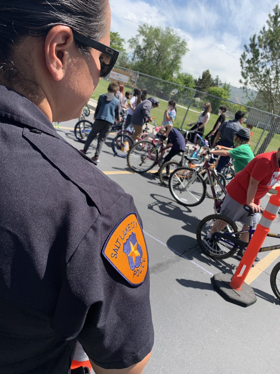 slcpd's tweet photo. After missing all of 2020 due to Covid, #BikeRodeos are back! We had a great time teaching bicycle safety and handing out helmets to kids this morning! We’ll have more bike rodeos later this summer, look for us! https://t.co/dWzg1wiTyT