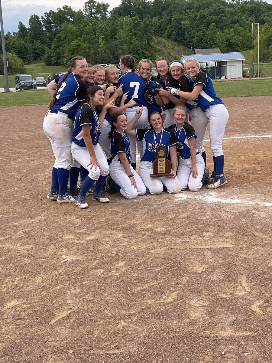WCcoachBink's tweet photo. Lady Wolves 2021 55th Fastpitch District Champions.  A FINISH to a CHAMPIONSHIP that will be remembered for ages!!  The Grit that this team showed is unmeasurable!!  Looking forward to getting back on the field Saturday.   TEAM to the end!! GO BLUE @CamilleWYMT @BGSportsNation https://t.co/GeKpIqOFTj