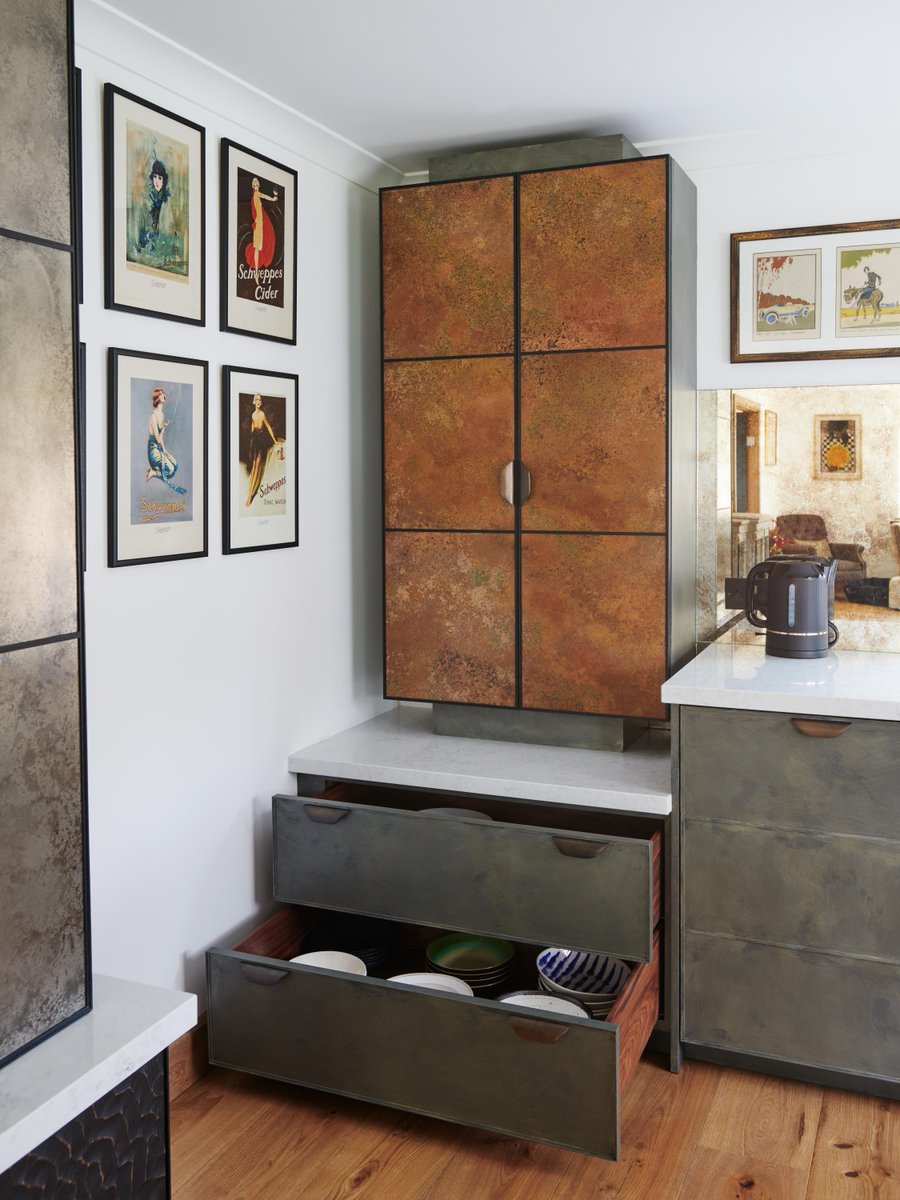 Our two door aged verdigris copper cupboard with aged brass Charlie handles, works beautifully with the Arabesque worktop and our specialist burnished paint effect drawers.